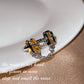 Sweet cool wind creative chain cross ring female light luxury yellow diamond color treasure ring pink diamond open ring